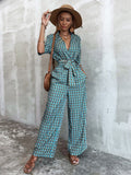 CHICMY- Plunging Neck Allover Floral Print Belted Jumpsuit