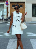 Chicmy-nye outfits Elegant Knitted Bow Sleeveless Short Dress Women O Neck Pockets A-line White Dresses 2025 Summer All-matching Lady Beachwear