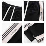 Chicmy- Stitching Side-stripe Track Pants