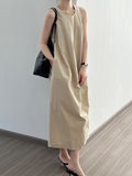 Chicmy-Solid Color Split-Joint Loose Sleeveless Round-Neck Midi Dresses