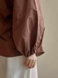 Chicmy-Buttoned Elasticity Pleated Solid Color Bishop Sleeve Long Sleeves Round-Neck Blouses&Shirts Tops